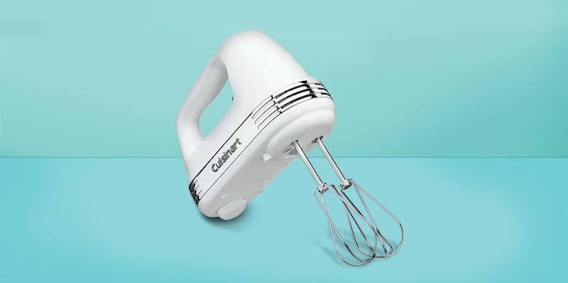 hand mixer on a blue background