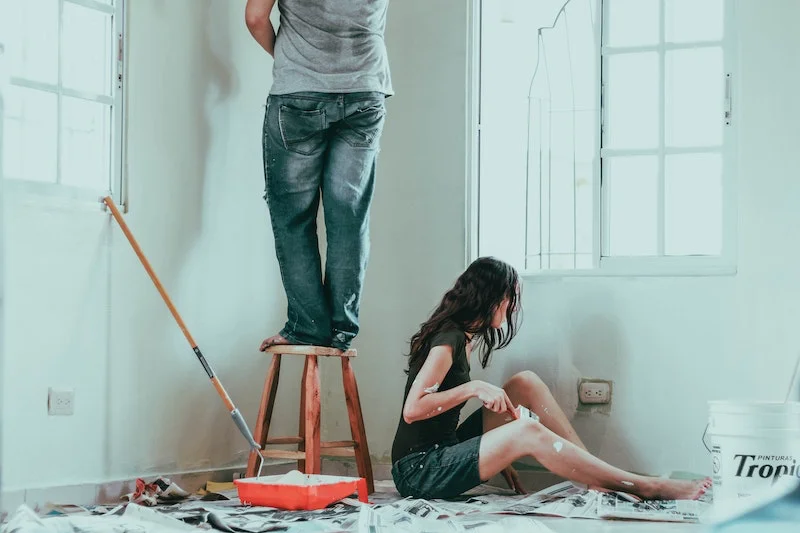 man and woman doing a renovation