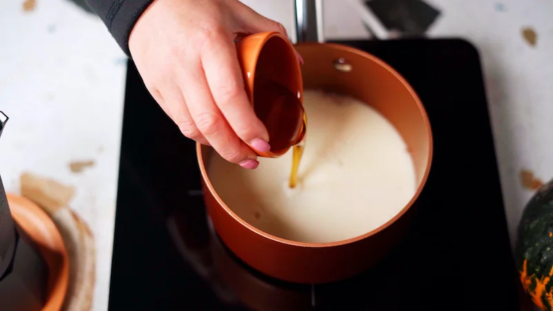 maple syrup poured into milk