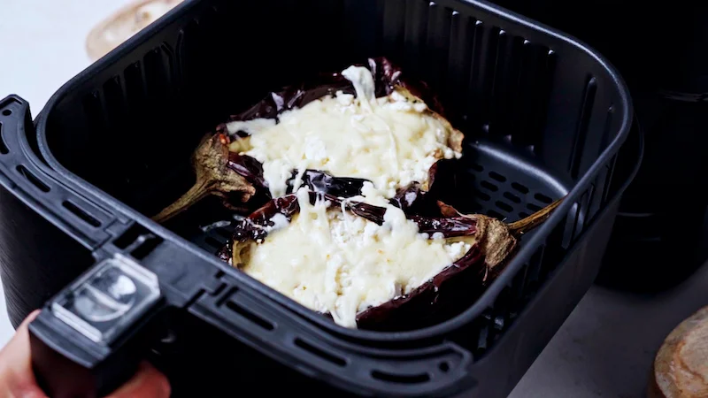 melted cheese on stuffed eggplant