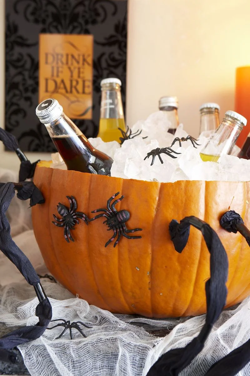 pumpkin carving ideas pumpkin carved into a bowl full of ice and drinks