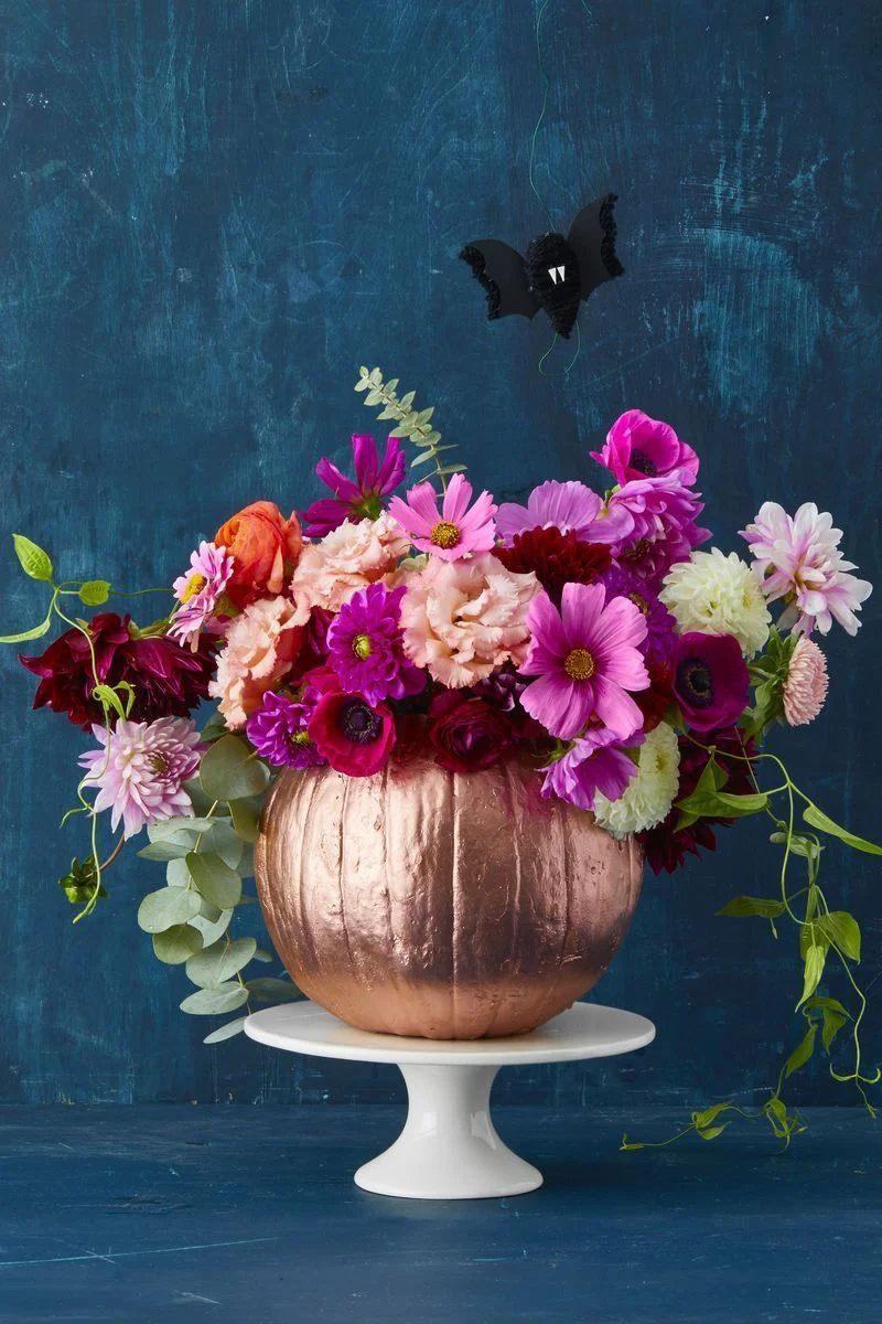 rose gold pumpkin with flowers on top