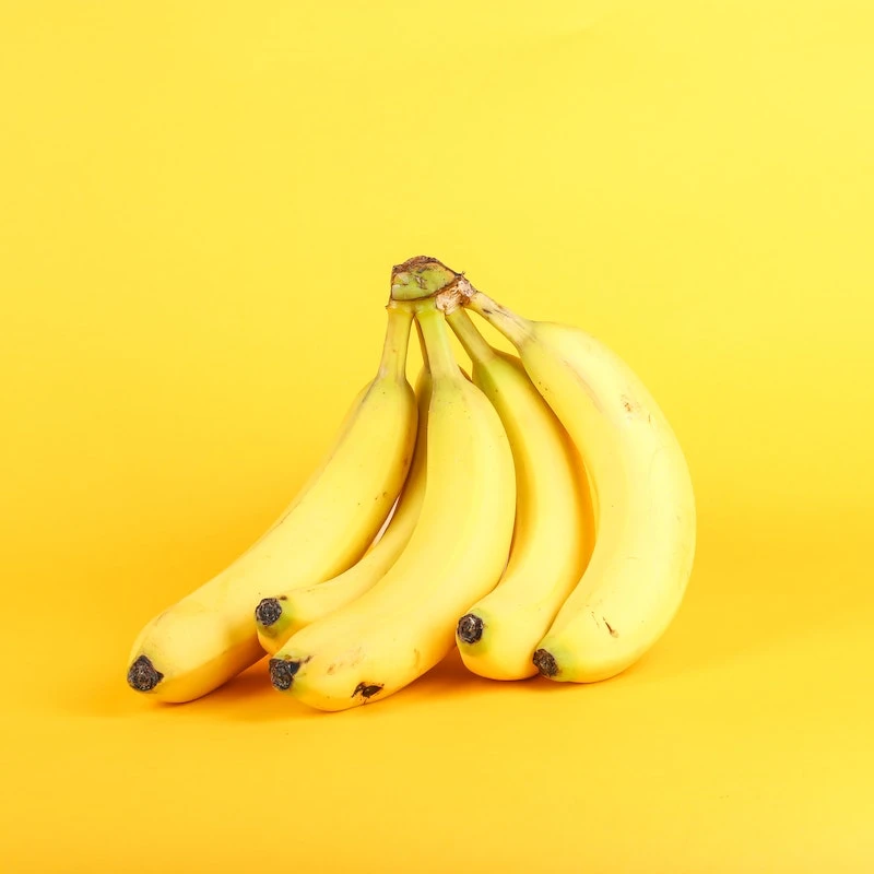 uses for plastic wrap bunch of banans on yellow background