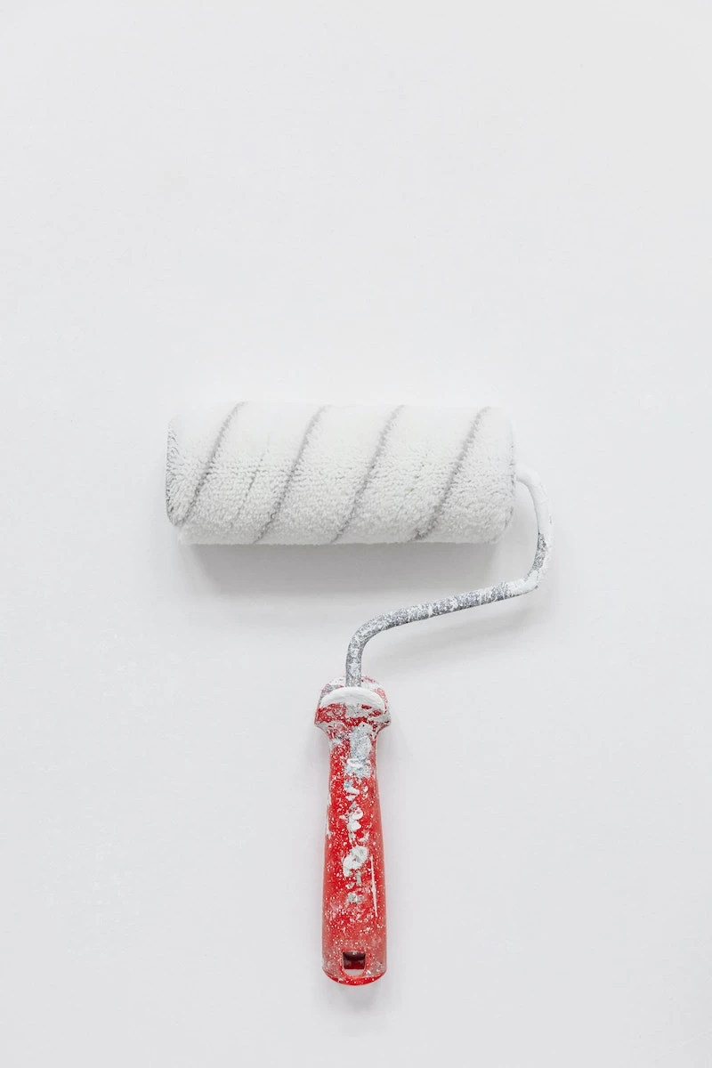 white and grey paint roller