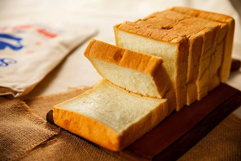 white bread loaf cut into slices