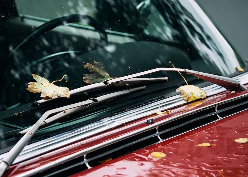 windshield wipers on a red car