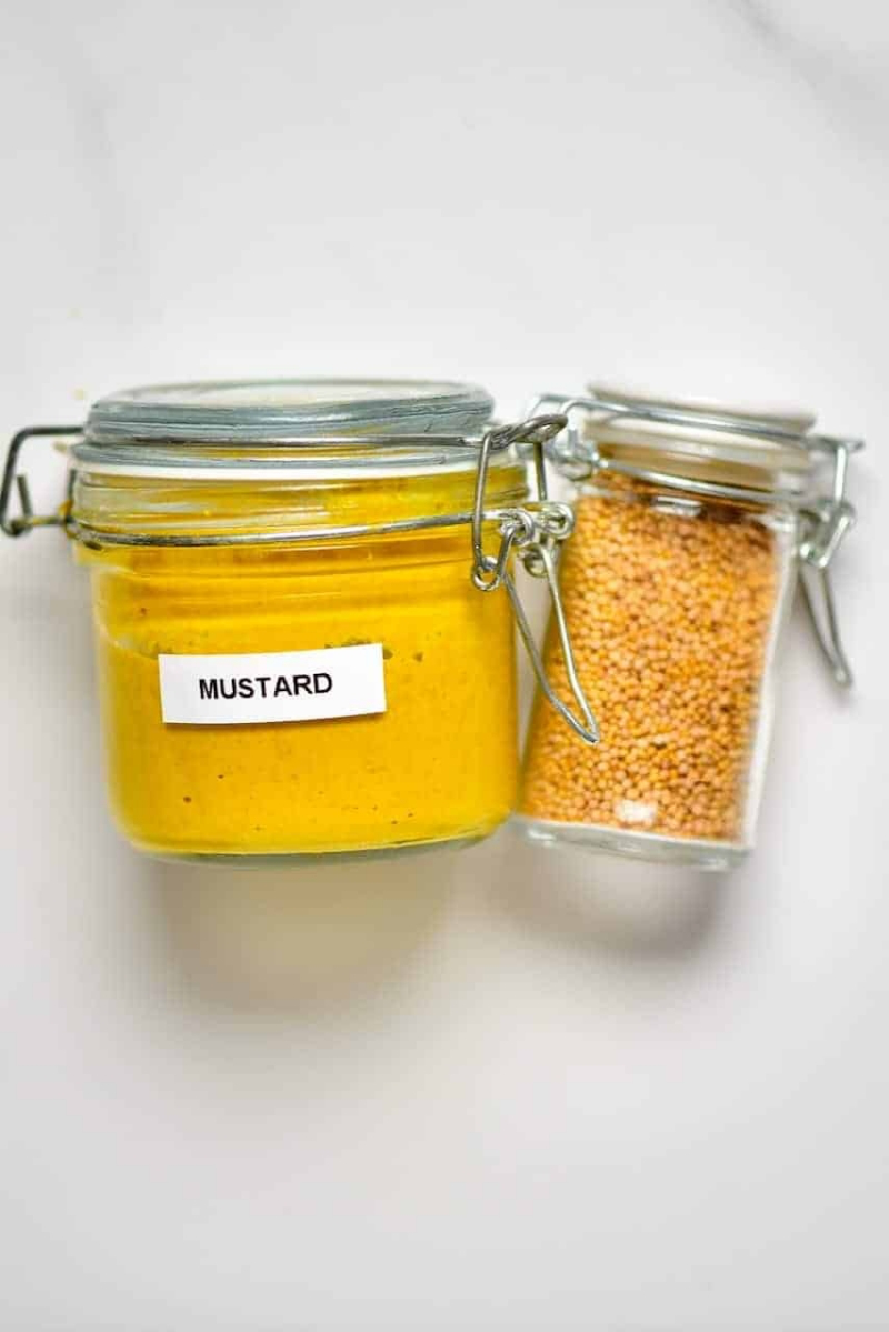 mustard seeds and jar of mustard