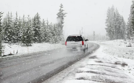 car driving in snowy conditions