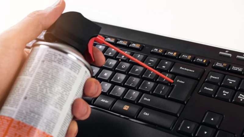 compressed air can cleaning keyboard