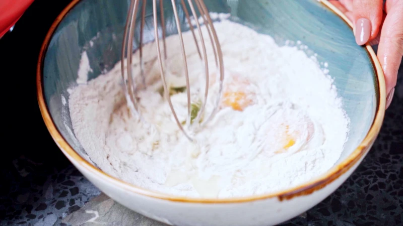 flour eggs and a whisk