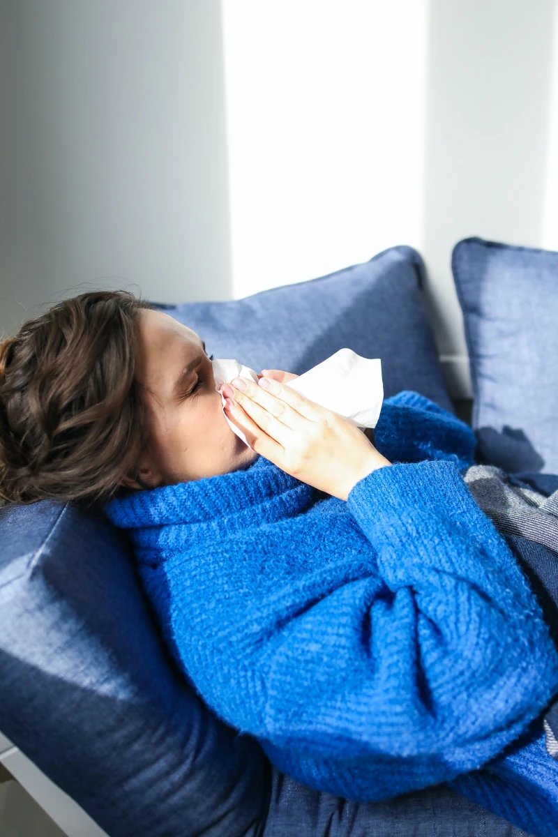 foods to eat when sick woman sick on the couch