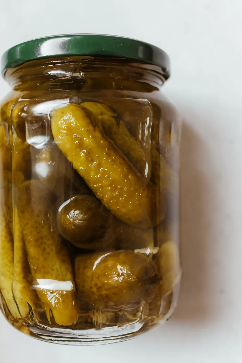 homemade pickles jar of pickles on white background