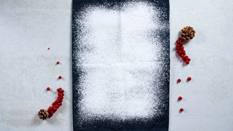 powdered sugar on a thin kitchen towel