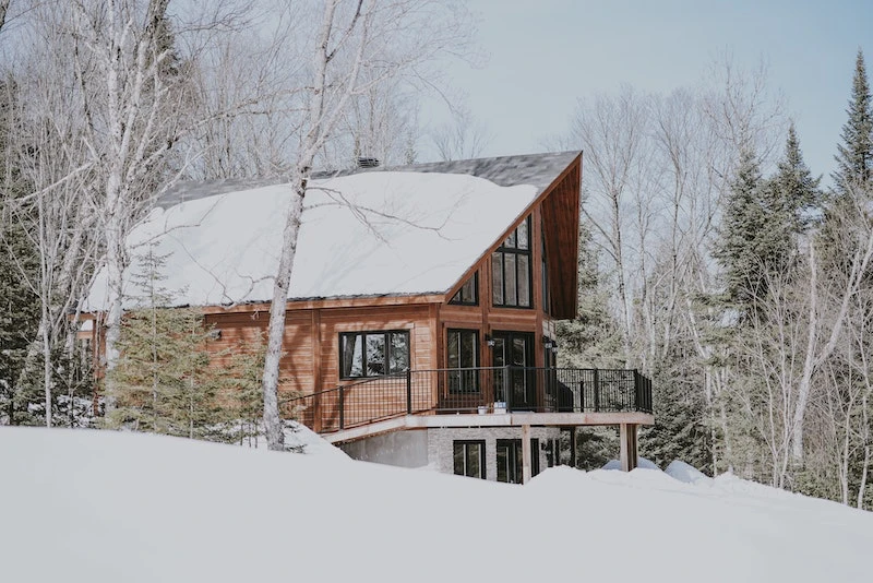 prepare your home for the winter home covered in snow