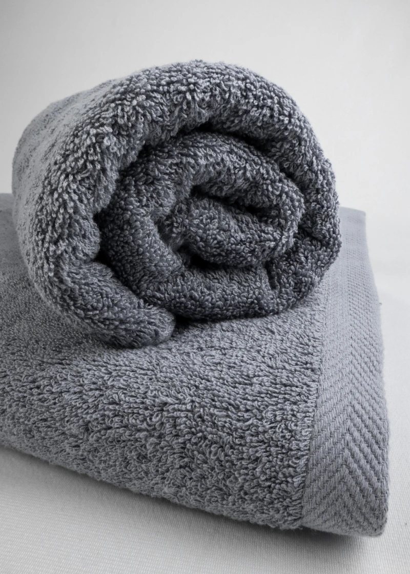 rolled up gray towel