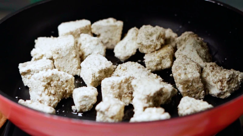 tofu in a black pan