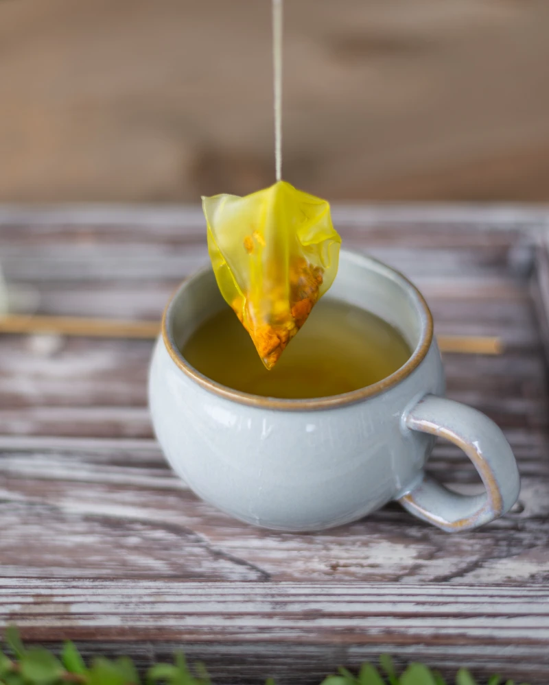 turmeric tea bag out of tea cup