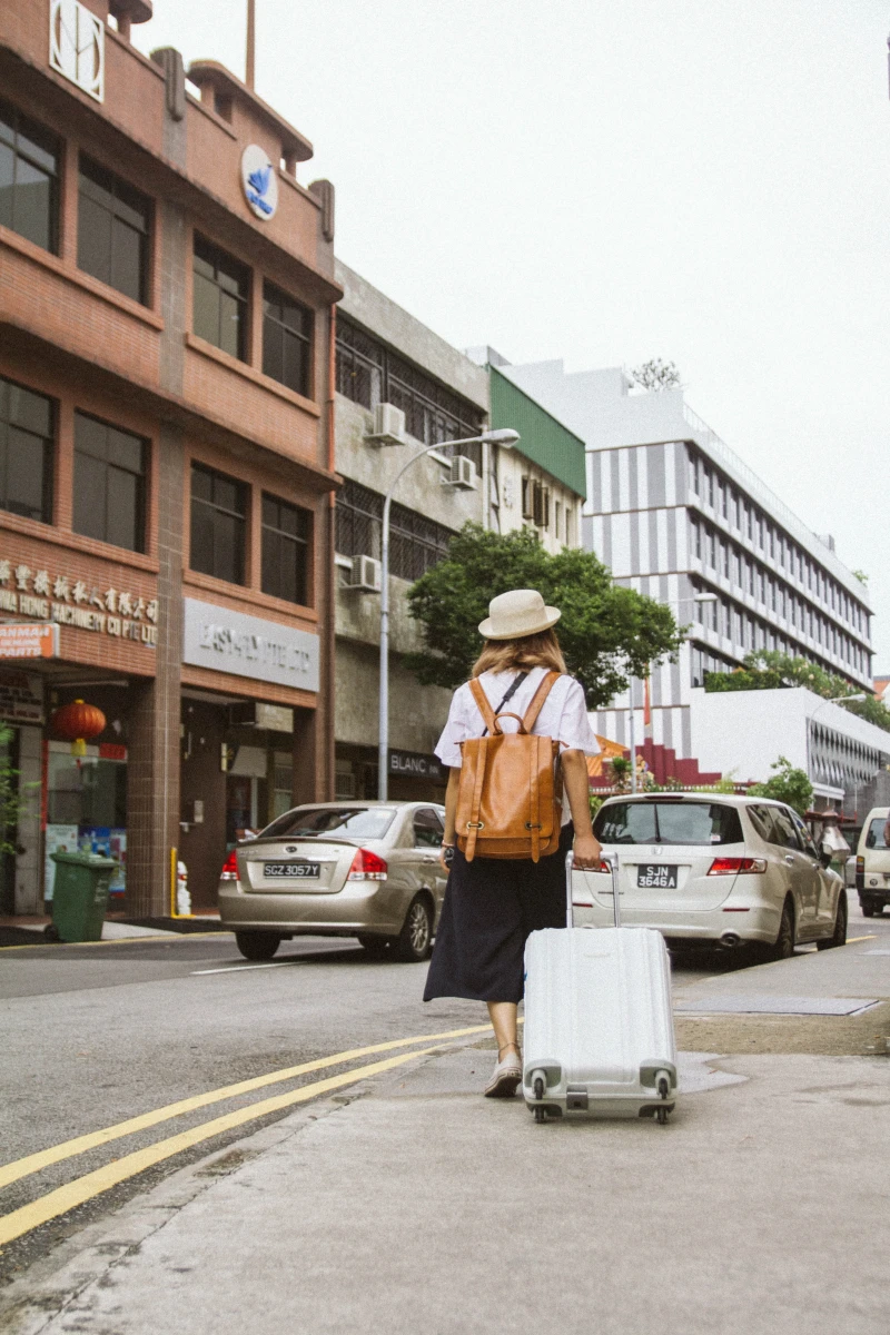 woman pulling her luggage