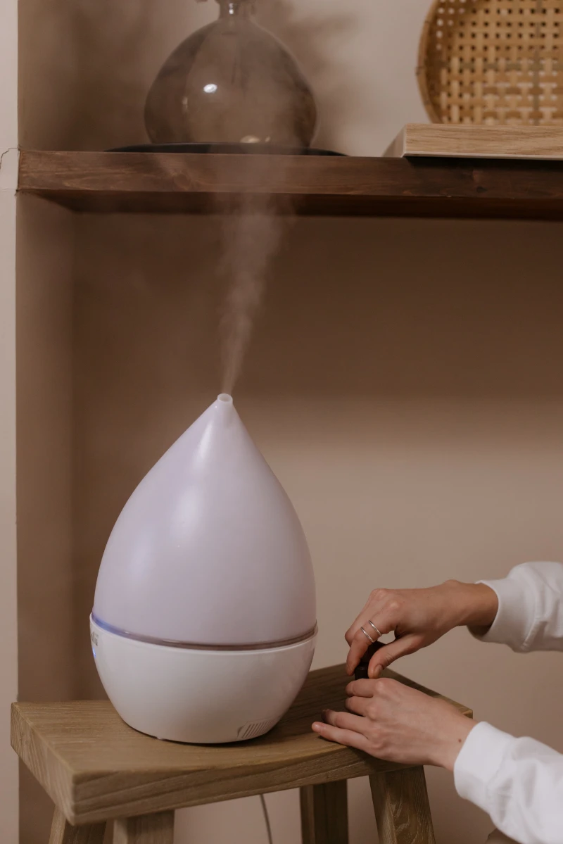 woman putting on a humidifier to work