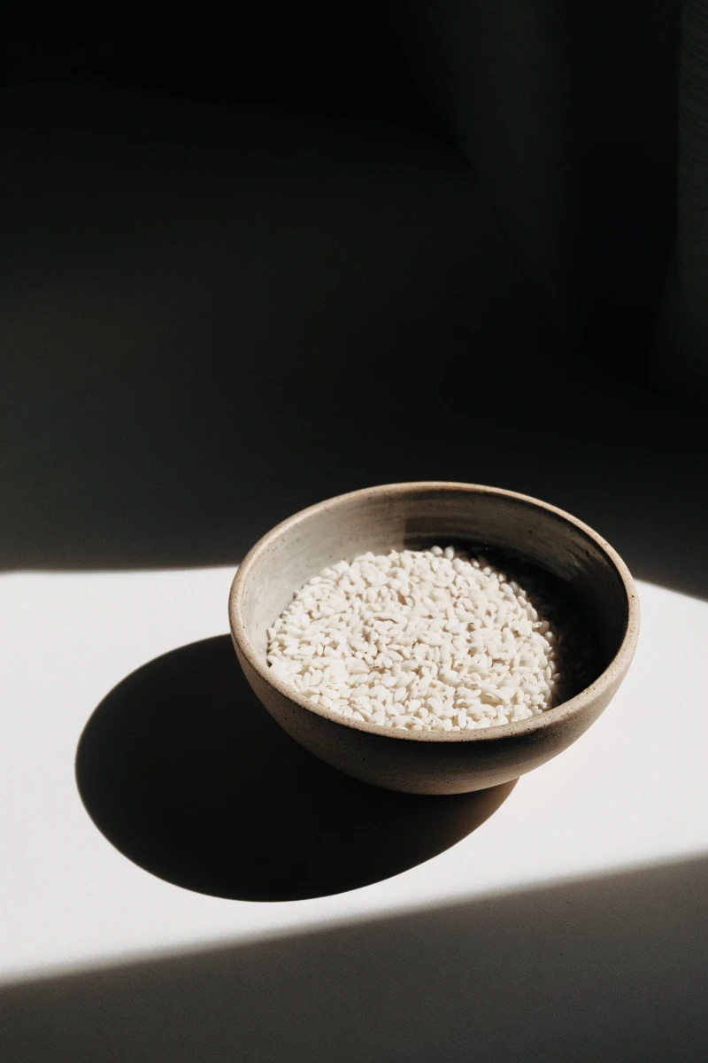 bowl of white rice in light
