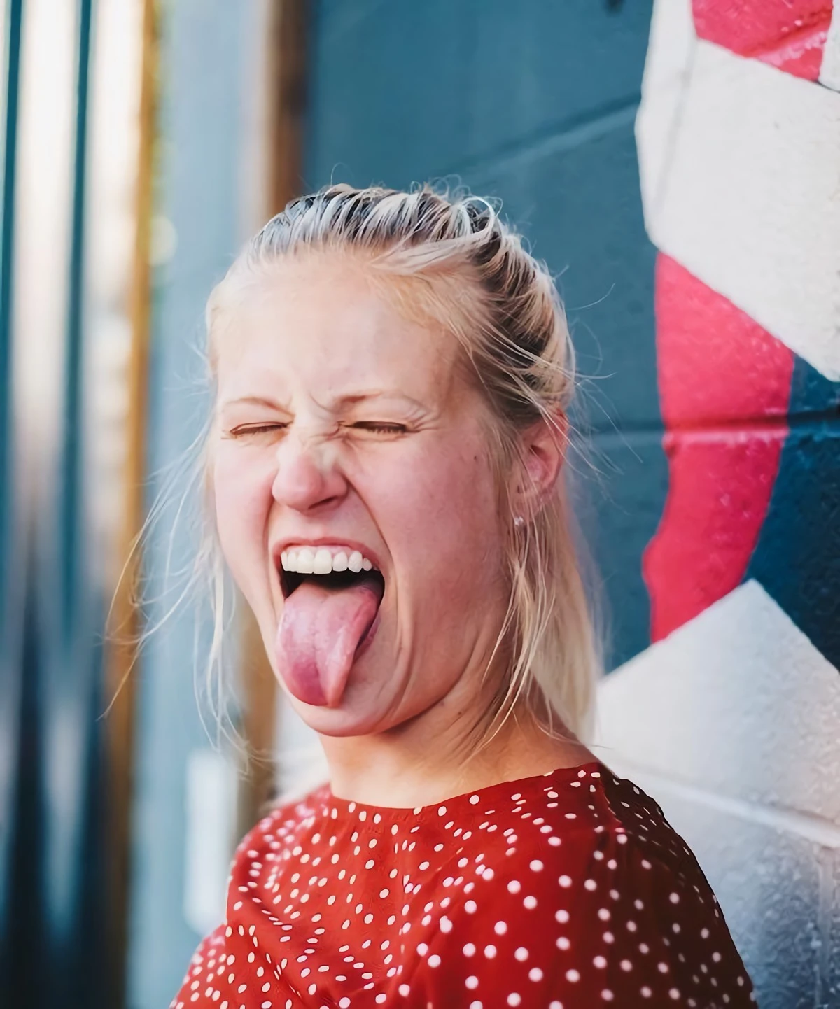 burnt tongue woman sticking out her tongue