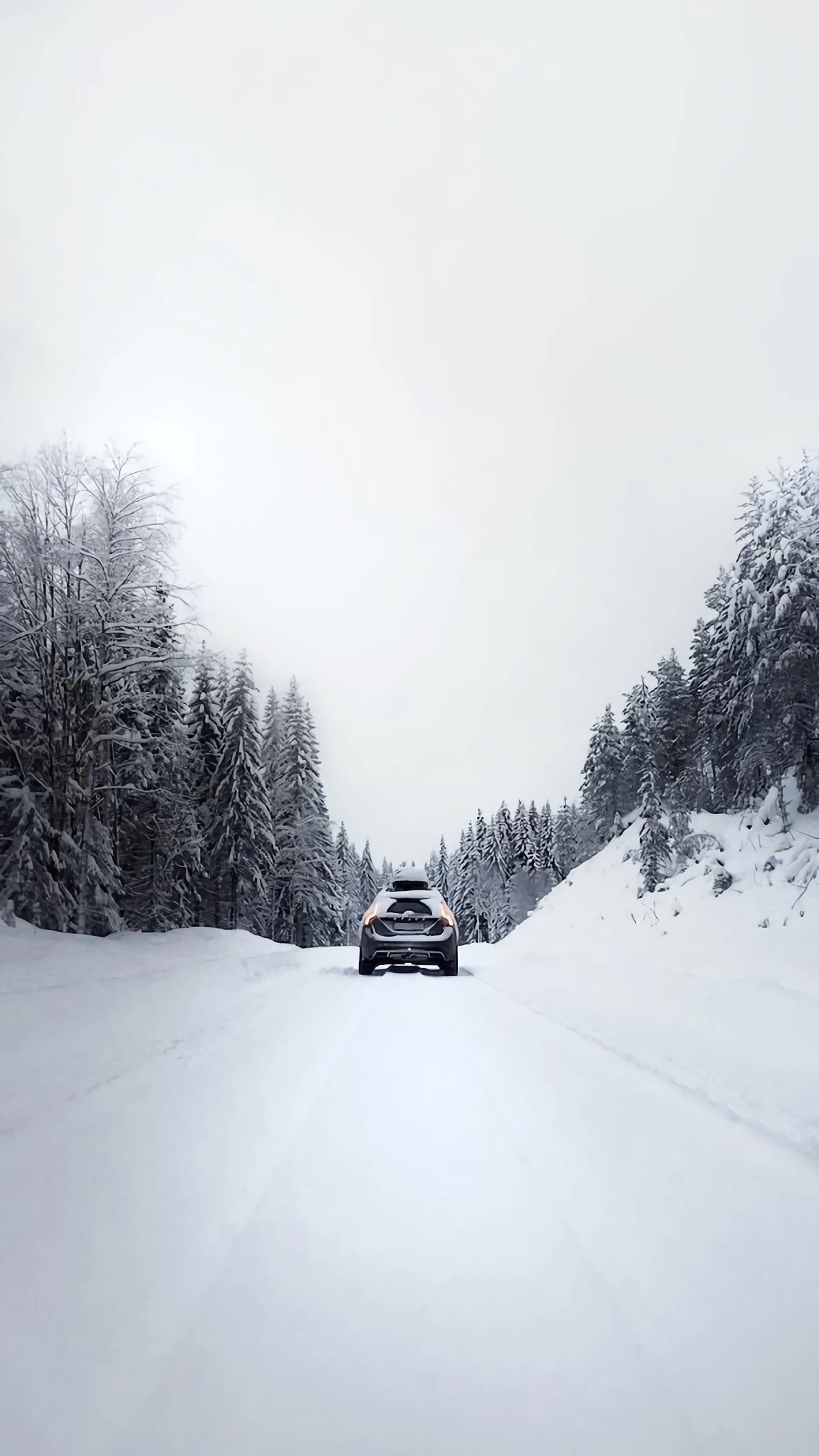car driving on a snowy road