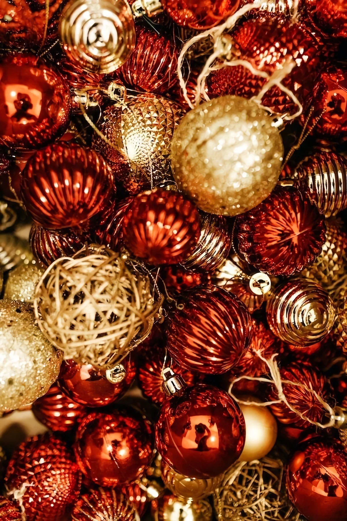 different red and gold tree ornaments
