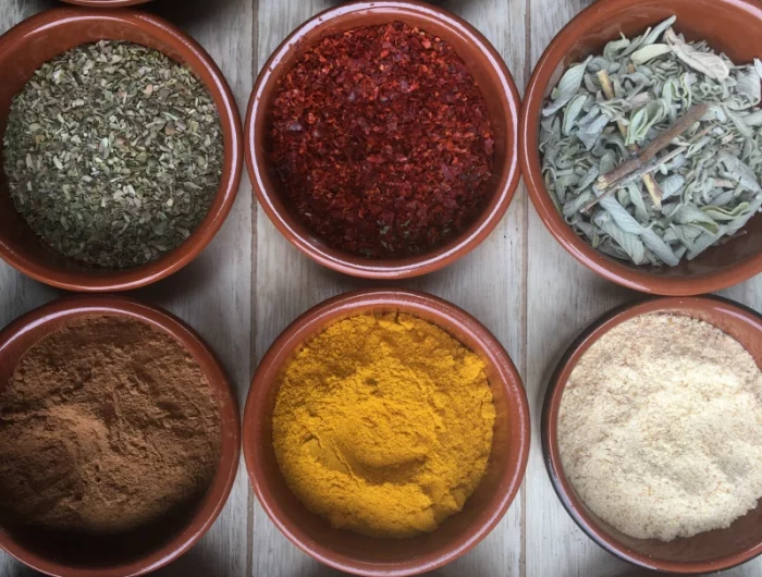 different spices in bowls