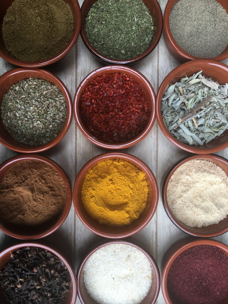 different spices in bowls