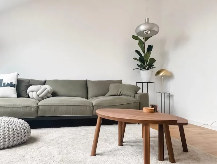 gray couch with wooden table