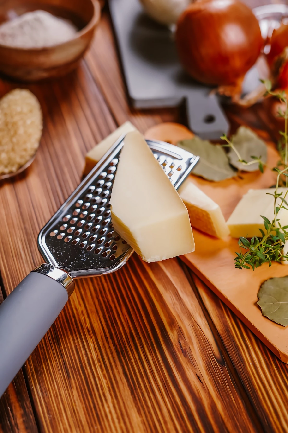 gruyère cheese on a grater