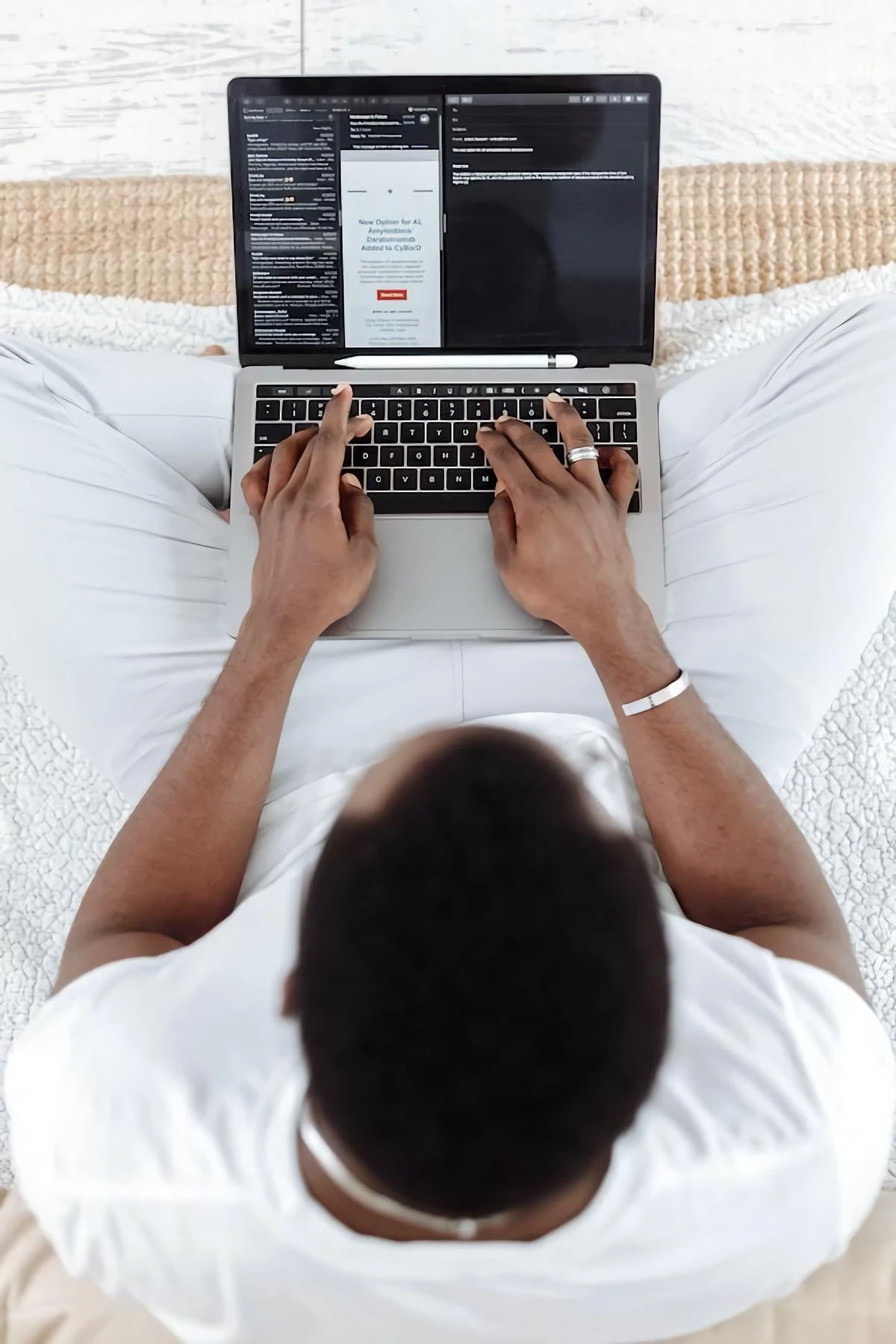 man working from his computer