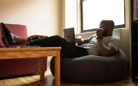 man working from home and snacking