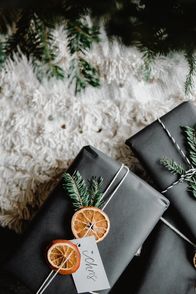 presents wrapped in black paper