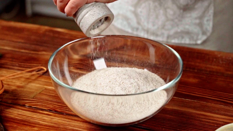 putting salt to wheat flour
