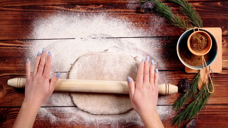 rolling dough with rolling pin