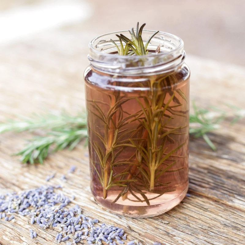 rosemary water in a jar