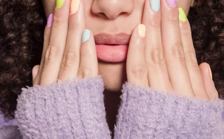 woman with every nail different color