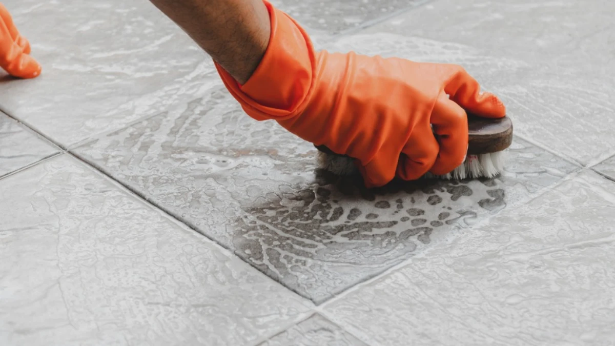 how to clean grout man cleaning grout