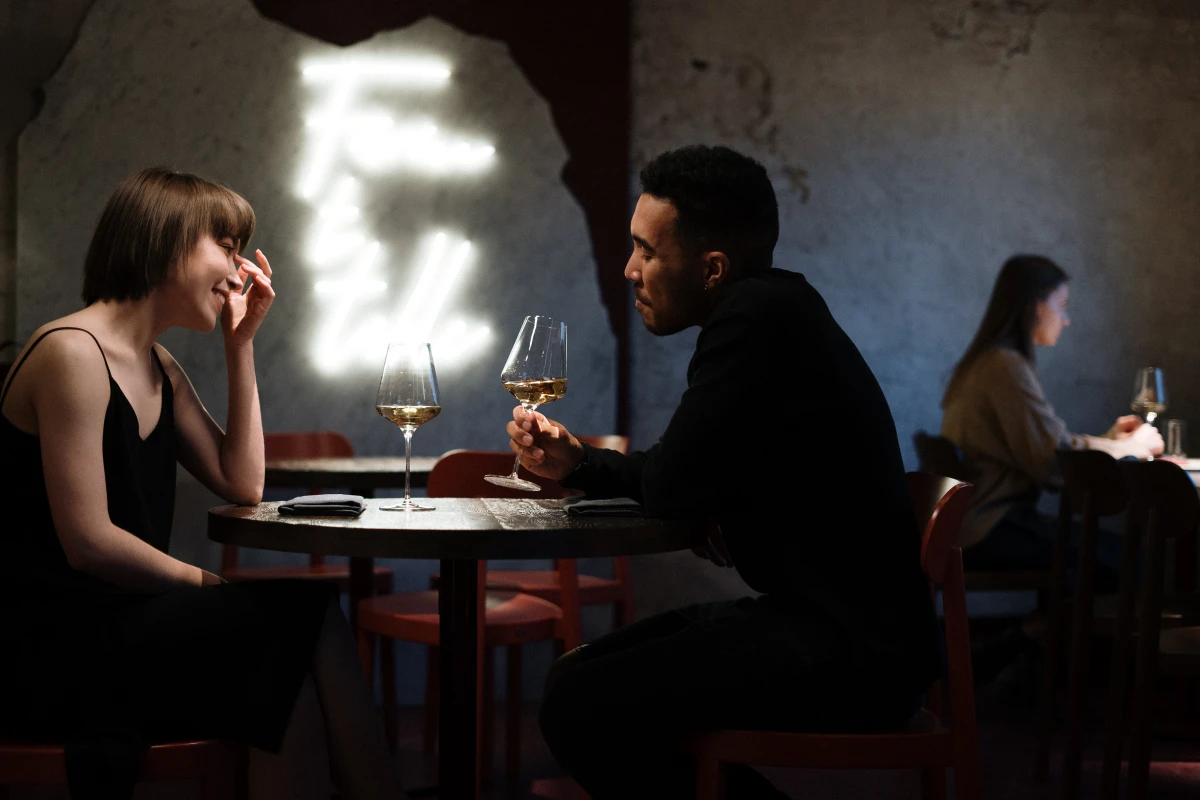 man and woman on a dinner date