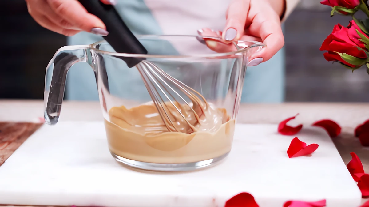 mixing melted chocolate mix for bark