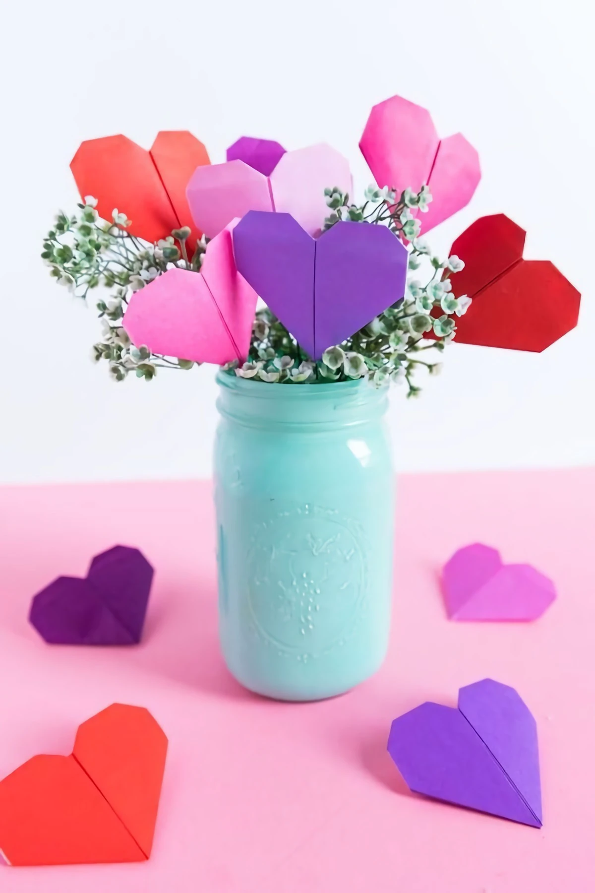 origami heart bouquet in a blue painted mason jar