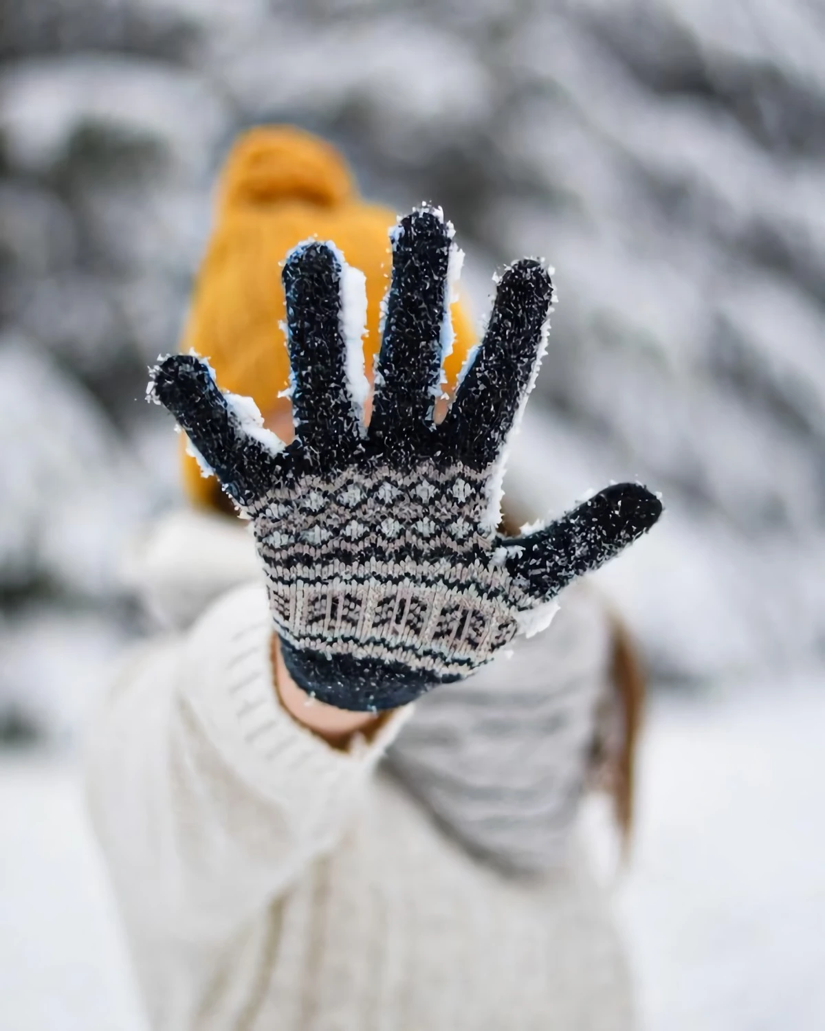 person showing their winter glove