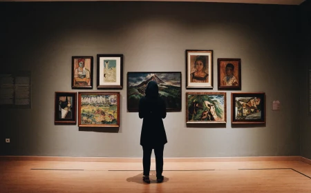 woman looking at a gallery wall