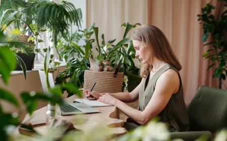 woman taking care of her plants