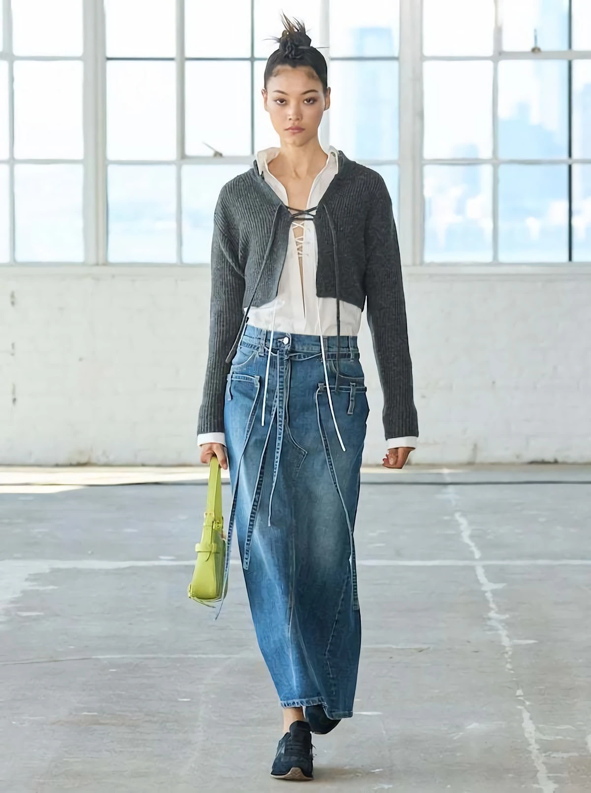 woman wearing a denim maxi skirt