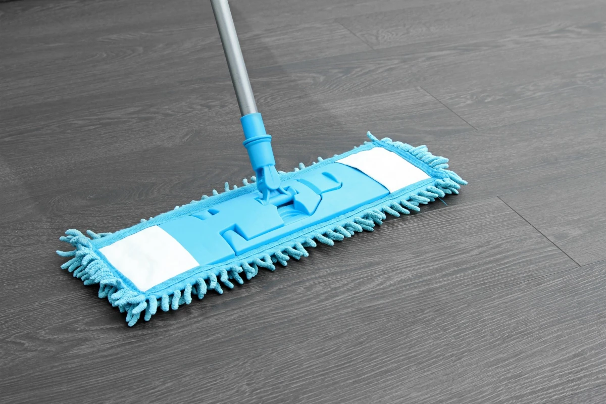 blue mop on laminate floor