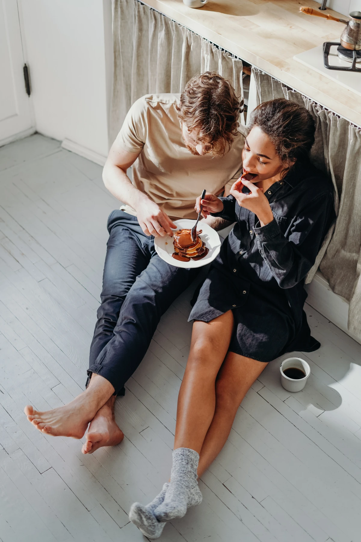couple eating on the floor