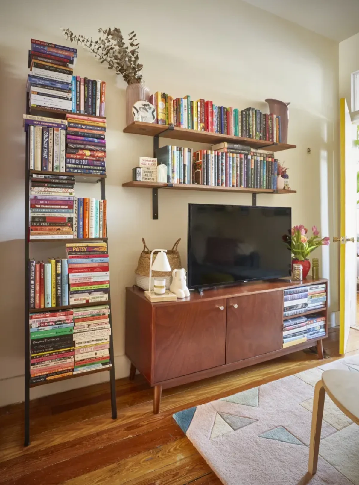 leaning ladder bookcase with books