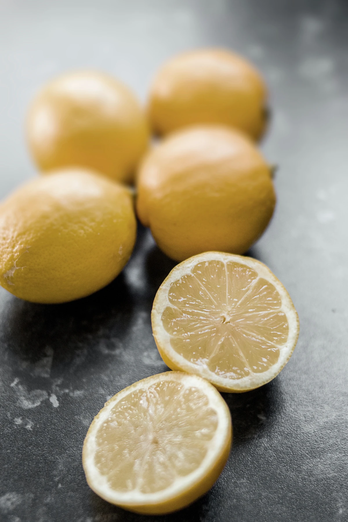 lemons whole and cut on counter